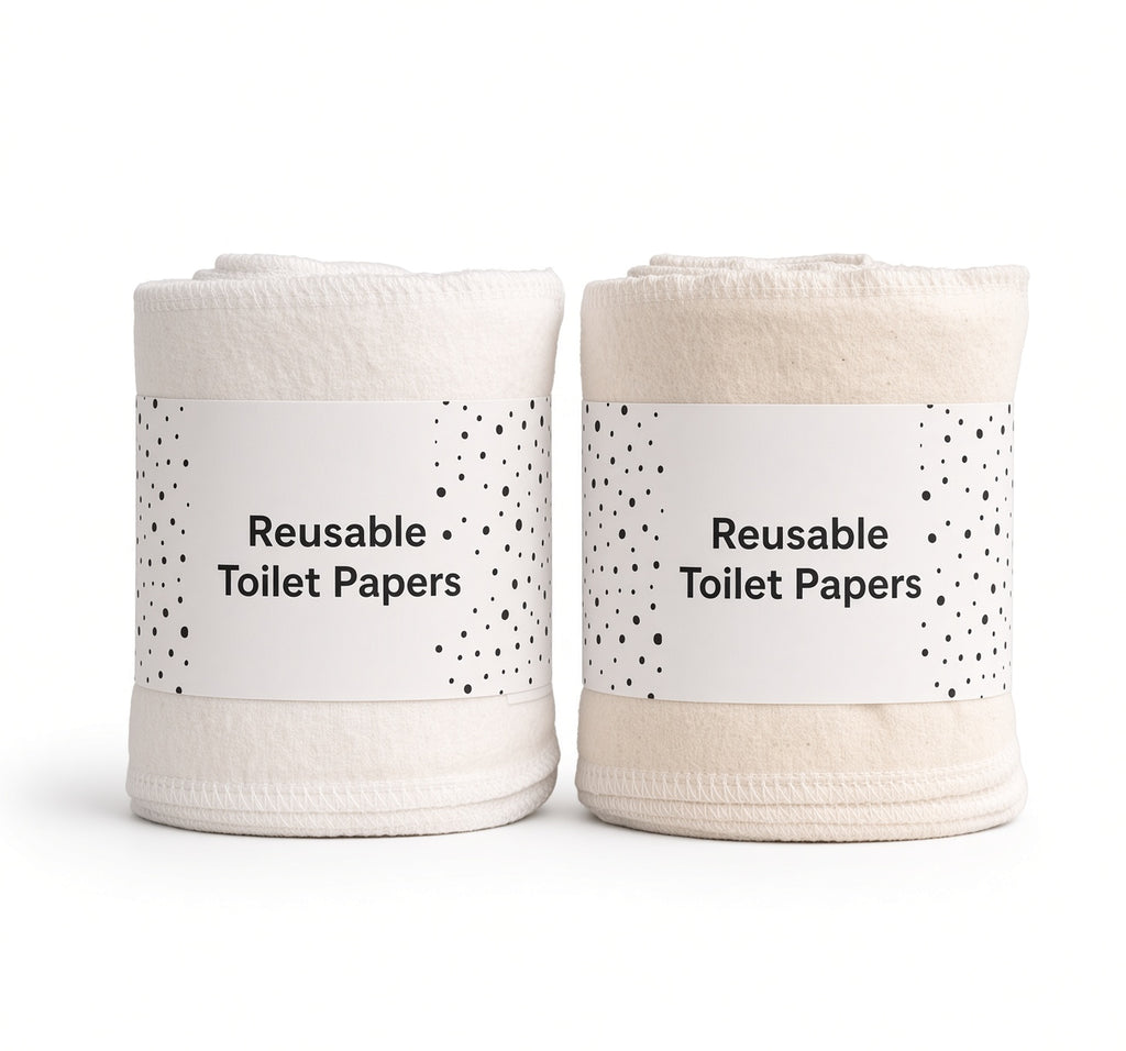 Two rolls of reusable cotton cloth, one white and one natural, with paper bands for off-grid hygiene